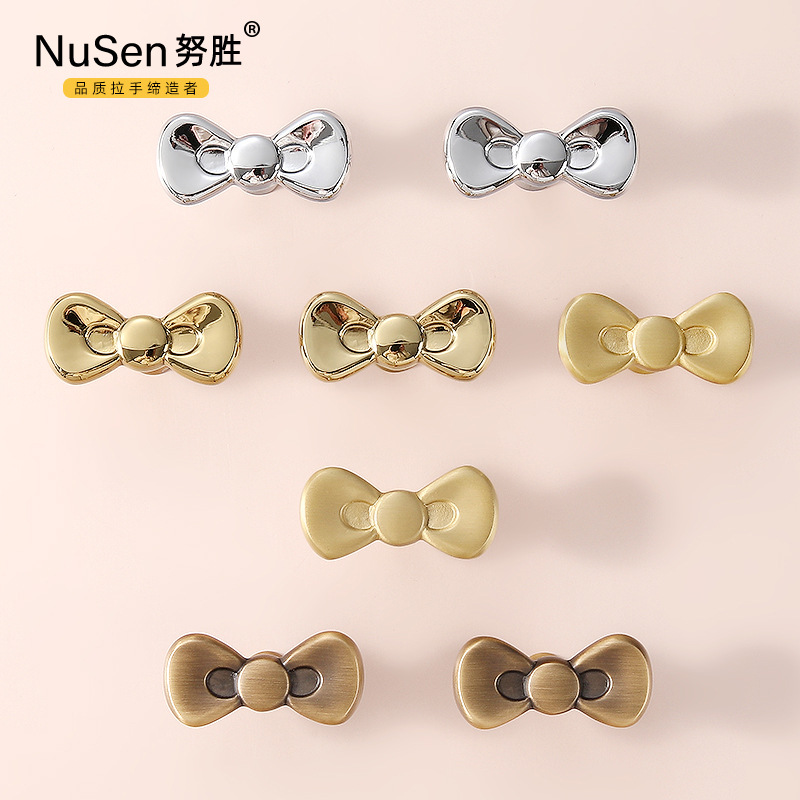 法式創意蝴蝶結拉手北歐輕奢現代簡約亮金銀色抽屜單孔衣櫃門把手