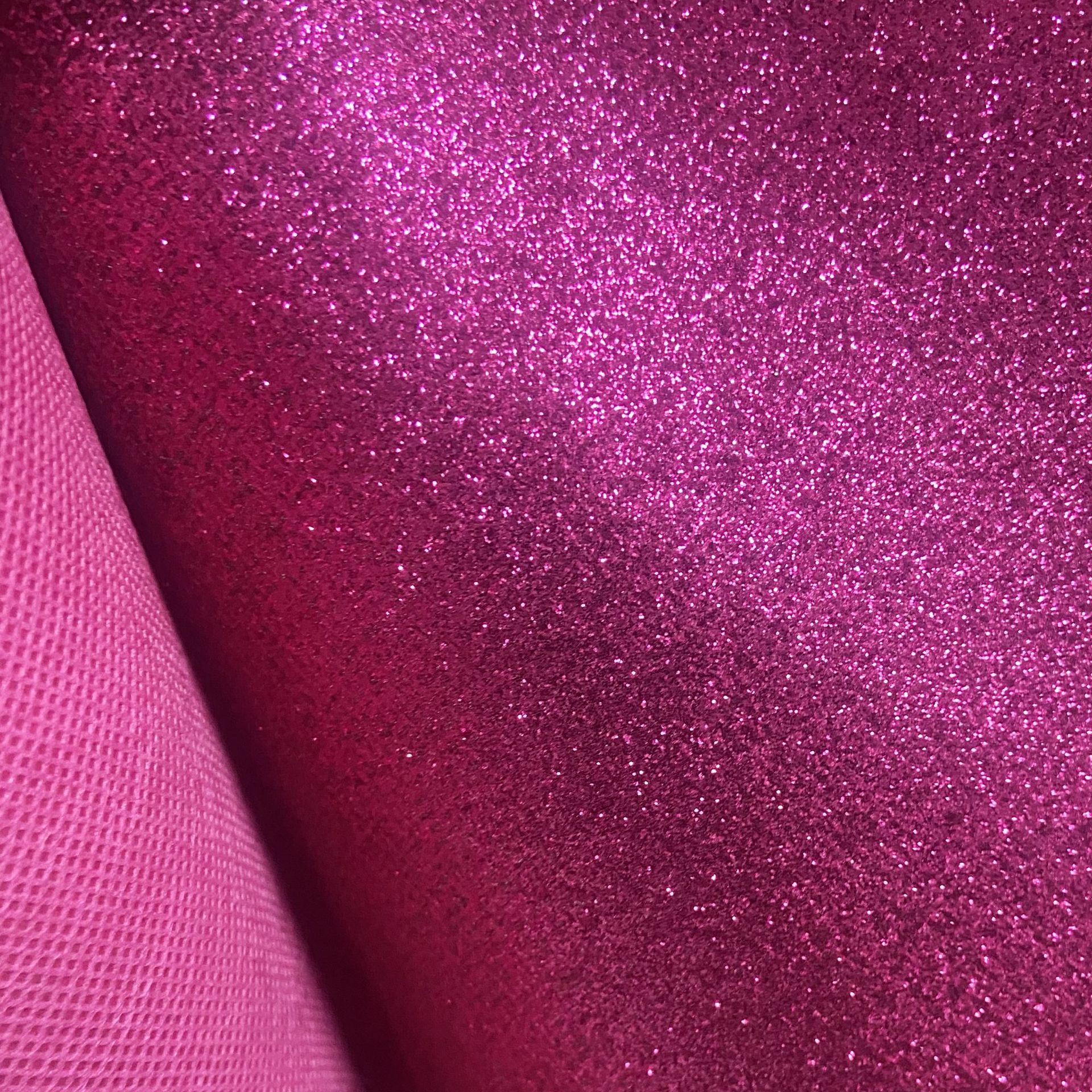 Suministro directo de fábrica de tela no tejida Glite Brillante Tela de lentejuelas Estuche para teléfono móvil Bolsa de cosméticos Accesorios para el cabello Decoración de ropa