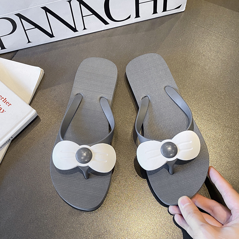 Zapatillas de flip flop para mujeres de verano nuevas parejas de internet resbaladiza playa de moda clip de pie resbaladiza ropa exterior