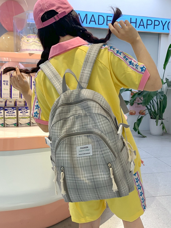新しい格子の学生のカバンの女性の韓国版の大容量のキャンパスの少女のリュックサックの中学生のリュックサック|undefined