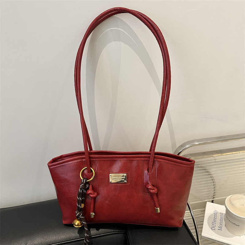 Alta sensación de viaje retro bolsas de gran capacidad para mujeres 2024 nuevo otoño invierno versátil bolsas de hombro de brazo bolsas especiales