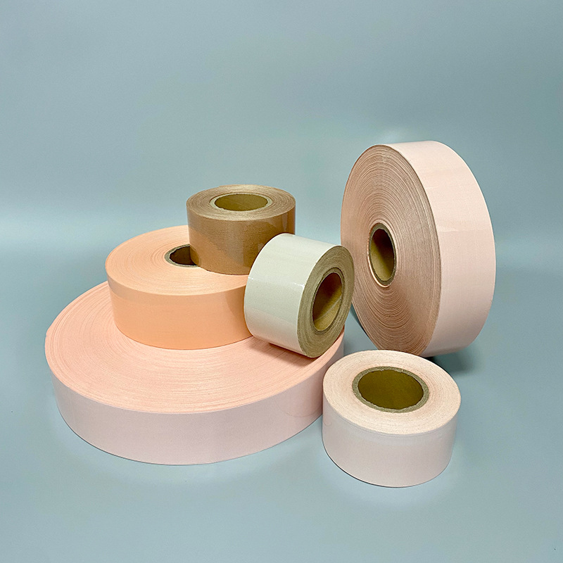 工厂肤色打孔PE皮肤无纺布水刺布胶带防水油胶压敏胶带半成品大卷