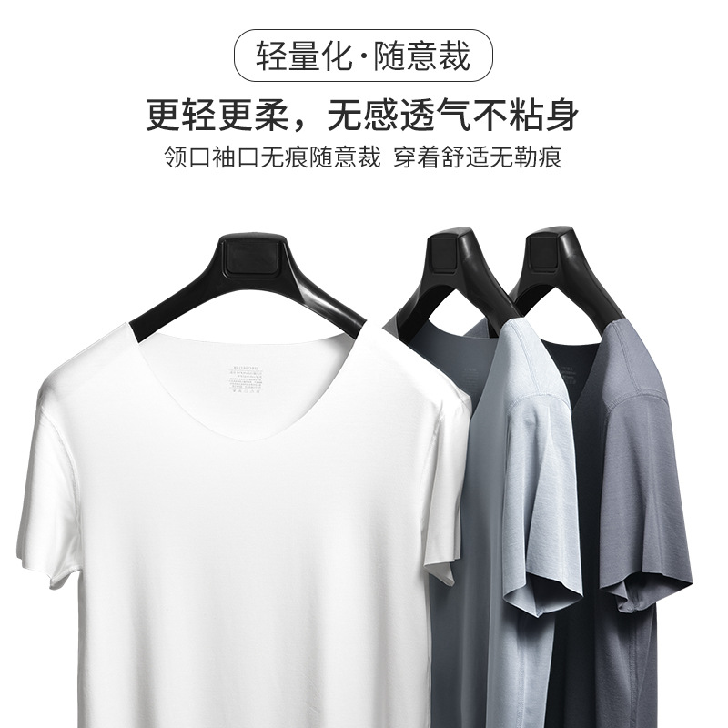 60 modal de primavera y verano de manga corta Camiseta de los hombres sin costuras de media manga pijamas se pueden usar fuera de la camisa de fondo delgada en stock