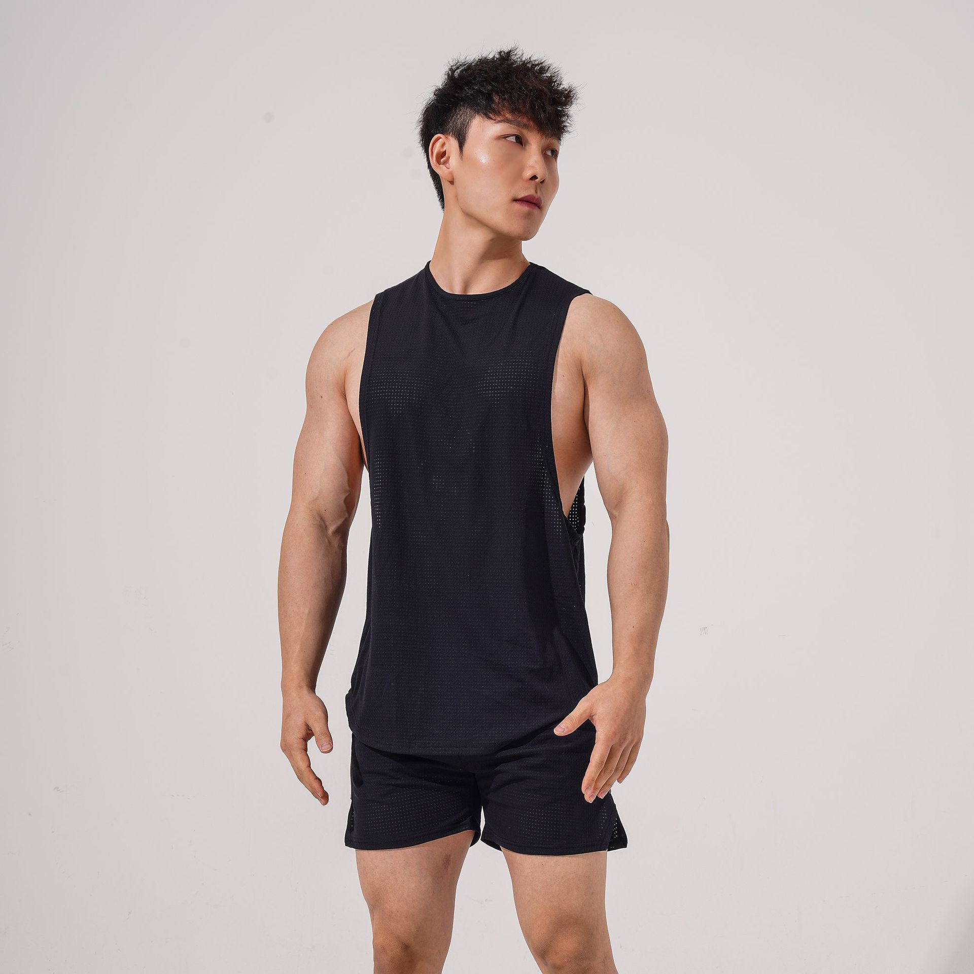 Chaleco transfronterizo de Europa y América malla de material de nylon de los hombres deportes gimnasio chaleco cuello redondo sin mangas en stock suministro