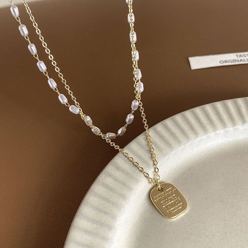 Double layer rice grain pearl necklace women's niche design light luxury sweater chain simple temperament sweater chain wholesale