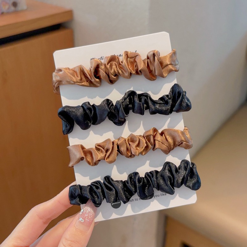 3 ¿ 4 anillos de pelo de intestino grueso de color café negro