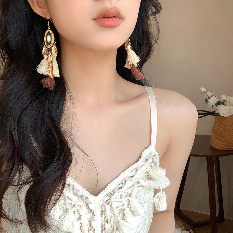 Pendientes de borla de media luna de fénix de estilo étnico Pendientes de diseño retro de nicho Pendientes de lujo ligero femenino de verano