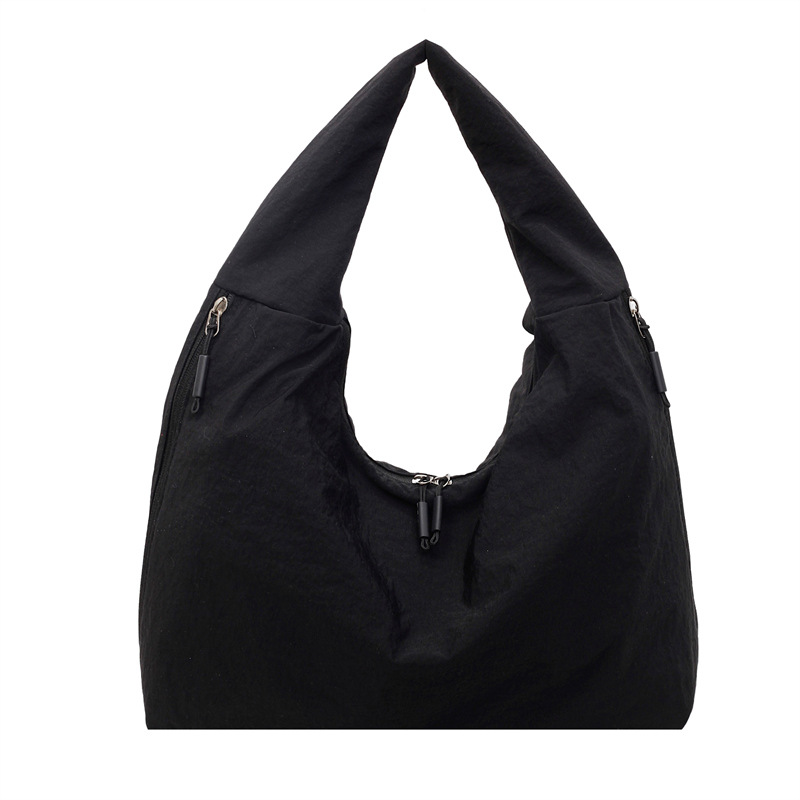 Bolsa de brazo de tela de nylon transfronteriza para mujeres 2025, nueva bolsa de hombro casual simple, bolsa de torneo casual universal