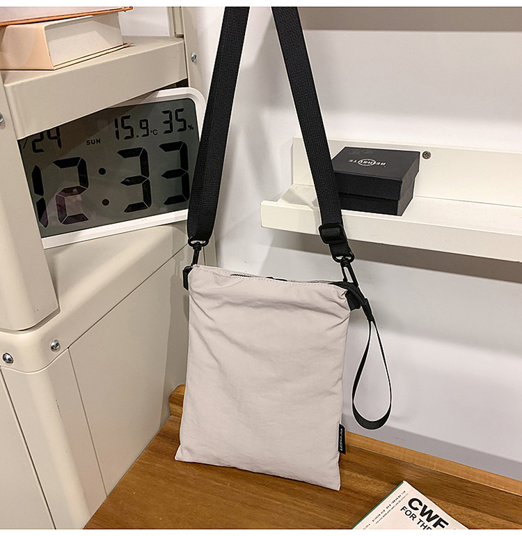 The 2025 summer new stylish, simple and individual small square bag is a trendy and casual single-shoulder crossbody bag for women undefined