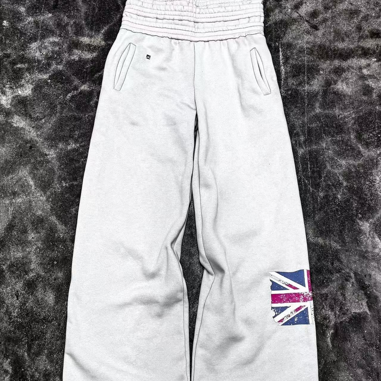 Europa y los Estados Unidos transfronterizos 2025 pantalones casuales de moda juvenil imprimido pantalones deportivos de bandera de moda pantalones cómodos de cintura alta pantalones largos