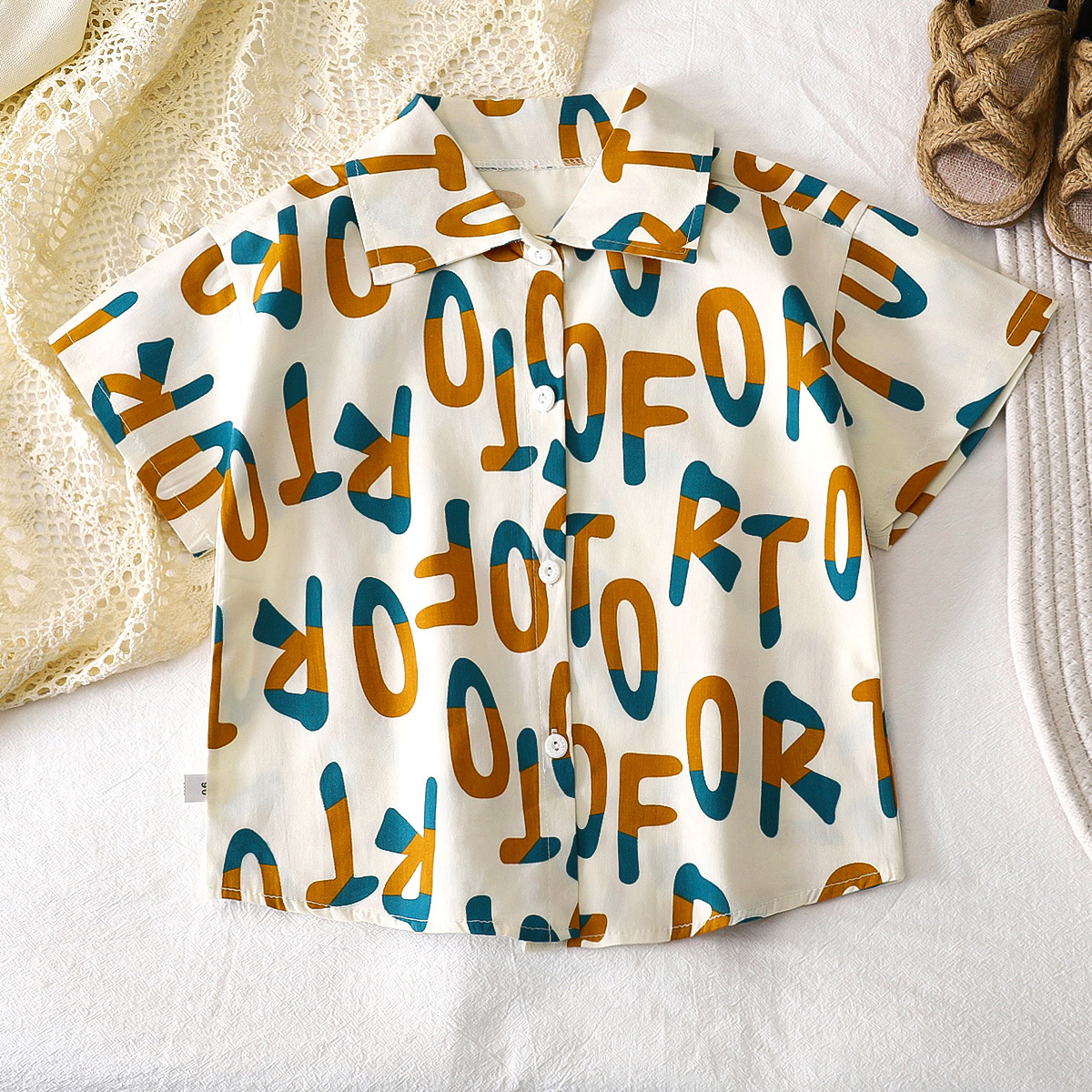 Camisas para niños verano algodón nuevo estilo niño coreano camisa de bebé de manga corta floral top para niños ropa para niños al por mayor