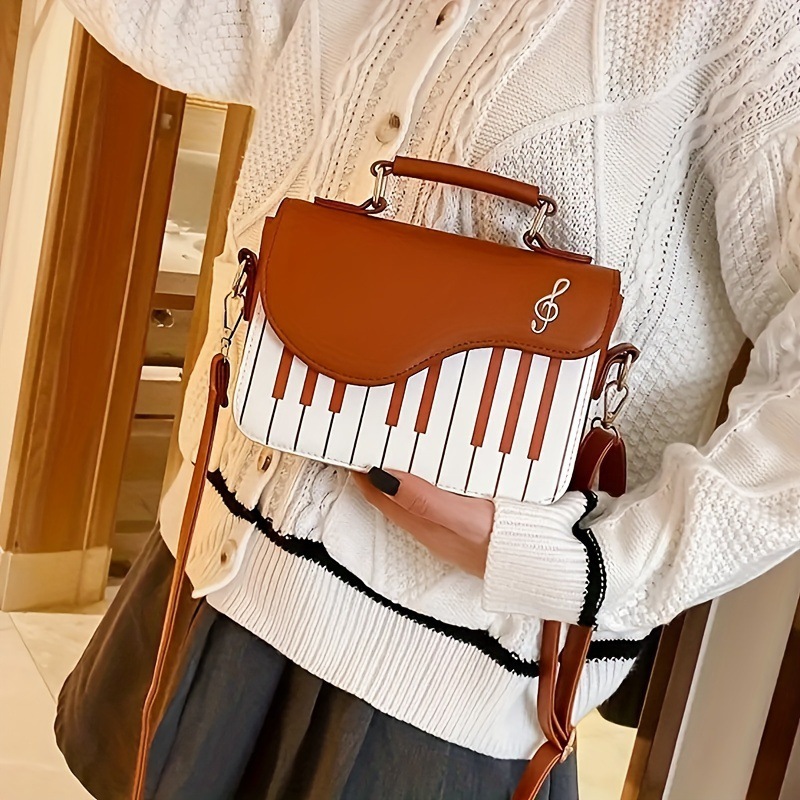 Borsa a spalla donna con ricamo note musicali e piano_voghion.com