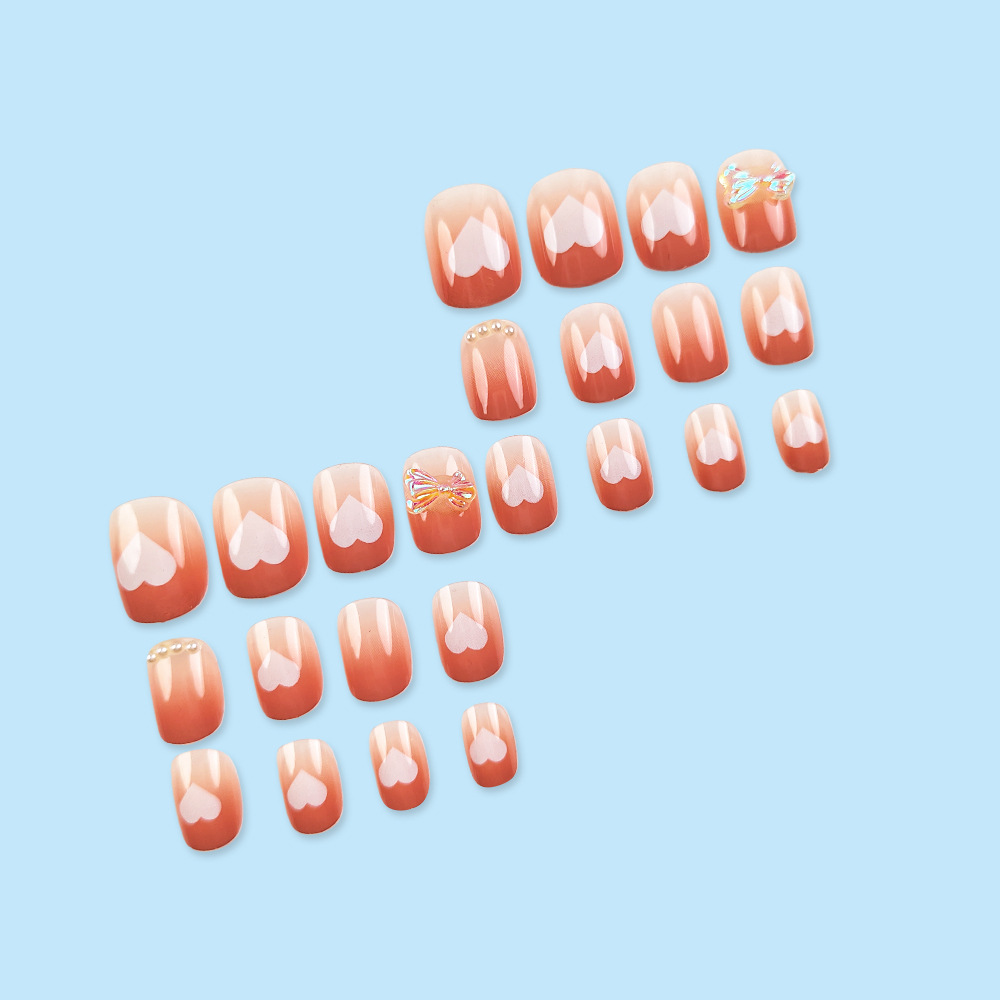 Polvo de melocotón gradiente amor arco manicure dulce dulce dulce punto lindo taladro de uñas 24 piezas de parche de uñas