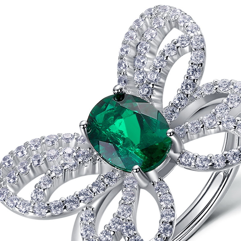 Exclusivo transfronterizo para el cultivo de mariposas Anillo de esmeralda Mujer S925 Cultivo con incrustaciones de plata