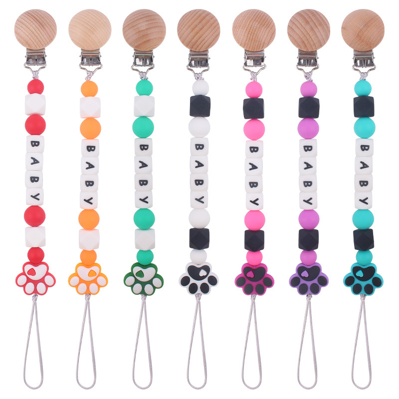 Nuevo bebé de dibujos animados de silicona perro garra mordedor creativo DIY bebé nombre mordedura chupete cadena anti-caída