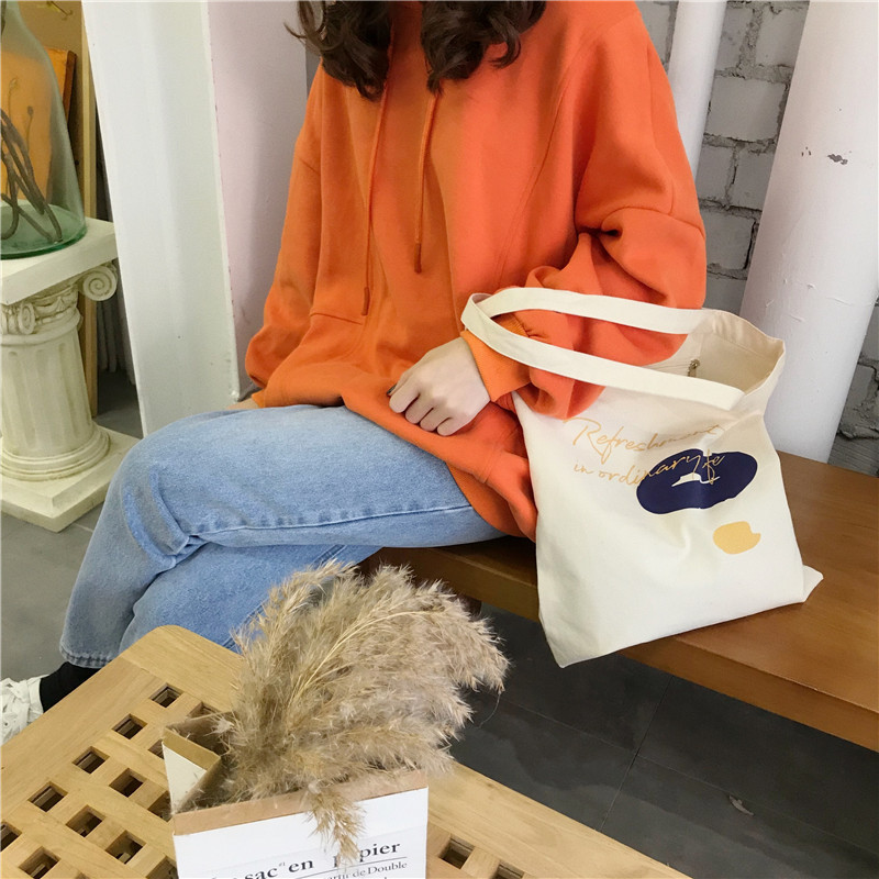E131 canvas bag, Korean-style ins hand-held shoulder bag, color block letter graffiti shopping bag, female student's search for sources undefined