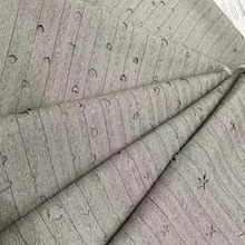 TR梭织弹力人字条纹满天星烫钻重工洞洞镂空外套西装套装时装面料