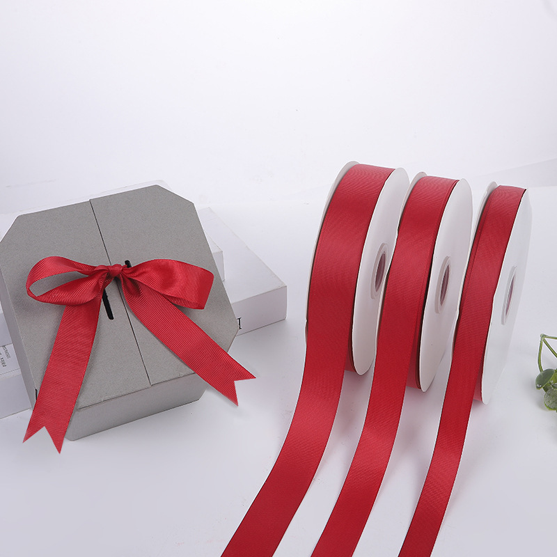 Suministro directo de fábrica hilo cinta vino rojo poliéster cinta flor caja de regalo embalaje de satén arco accesorios cinta al por mayor