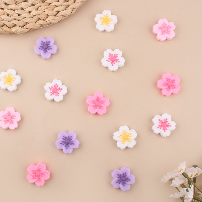 Productos creativos para bebés de bricolaje, flores de begonia, joyas de silicona, chupetes, accesorios de pulsera de mordedor de cadena anti-caída