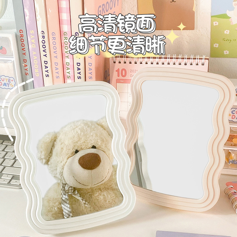 Espejo de maquillaje ondulado de maquillaje de niñas macarrón de alto valor espejo de dormitorio de oficina portátil colgar espejo