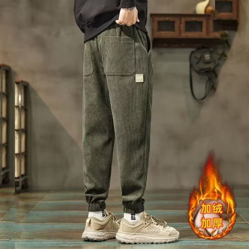 Pantalones casuales de cordillera de hombre, pantalones de caño, pantalones de marca de moda, pantalones de nueve puntos, moda variada.