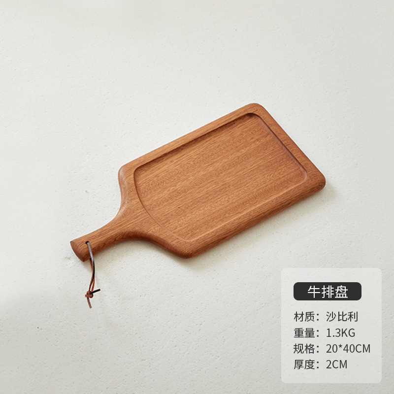 木のステーキの食事皿日本式の木のピザの皿の牛の板の食器の木の皿の木のトレーの洋食は皿を並べます。|undefined