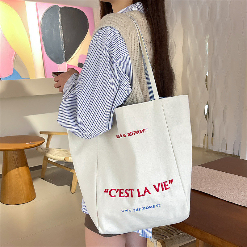 New Embroidered Letters Fashion Canvas Bag Double-sided Women's Shoulder Bag Casual Large Capacity Commuter Tote Bag New Embroidered Letters Fashion Canvas Bag Double-sided Women's Shoulder Bag Casual Large Capacity Commuter Tote Bag