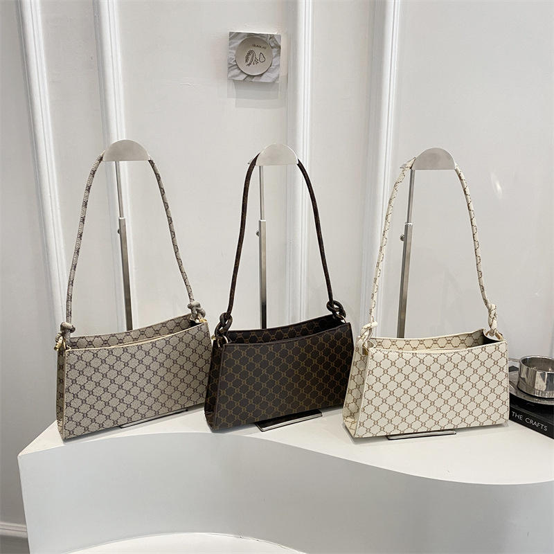 Bolsos bolsos de mujer 2025 primavera y verano nuevo estilo simple bolso de palo francés de cercanías impreso axila hombro pequeño mensajero pequeño bolso cuadrado