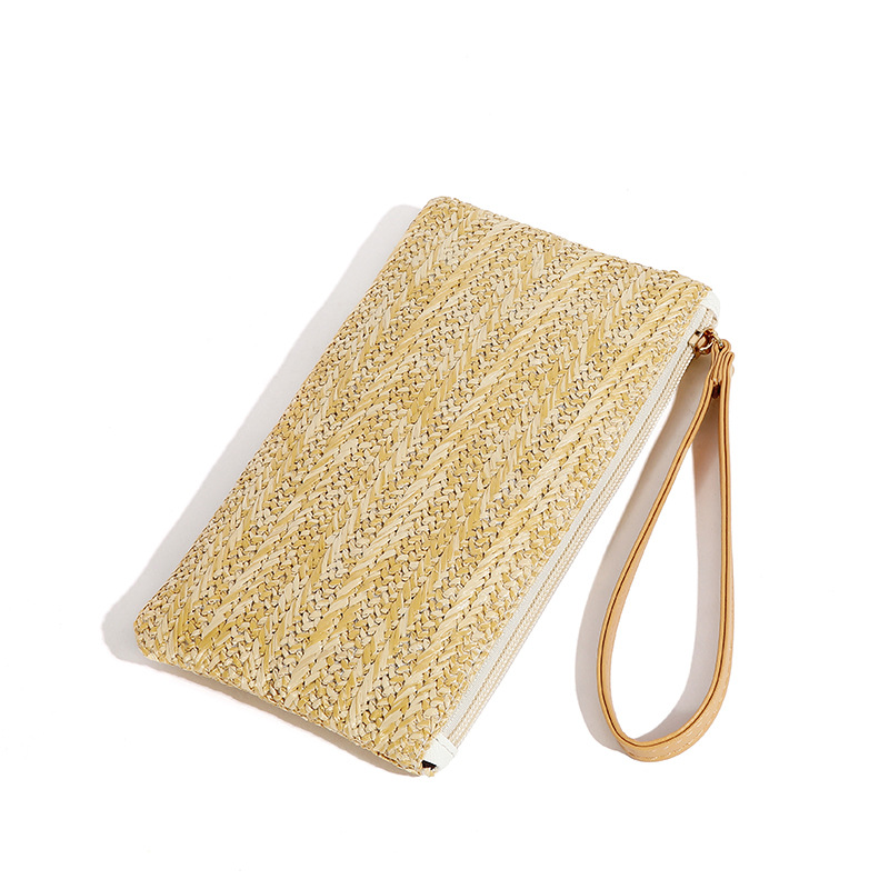 Bolsa de ombro em rattan trançado com acabamento em couro_voghion.com