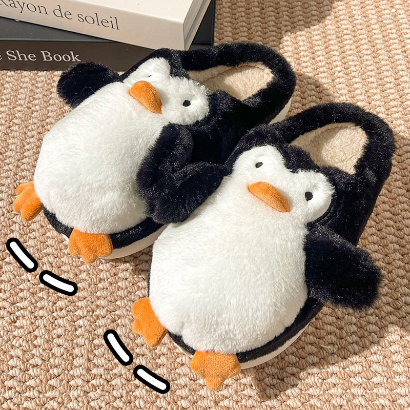 Pingüino Vaca Dibujos animados Zapatillas de algodón Hombres y mujeres Calidez antideslizante Baotou Zapatillas de algodón de felpa al por mayor