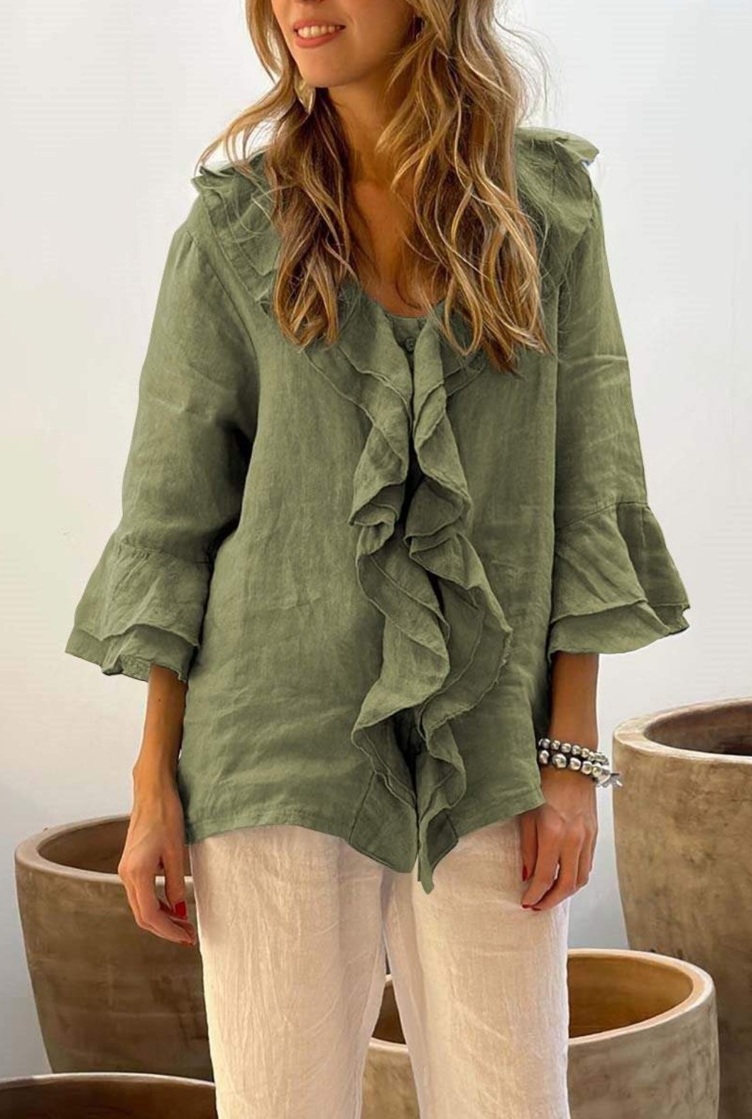 2024 estilo europeo y americano transfronterizo otoño color sólido nueva moda con cuello en V mangas voladoras con volantes suelta casual top mujer
