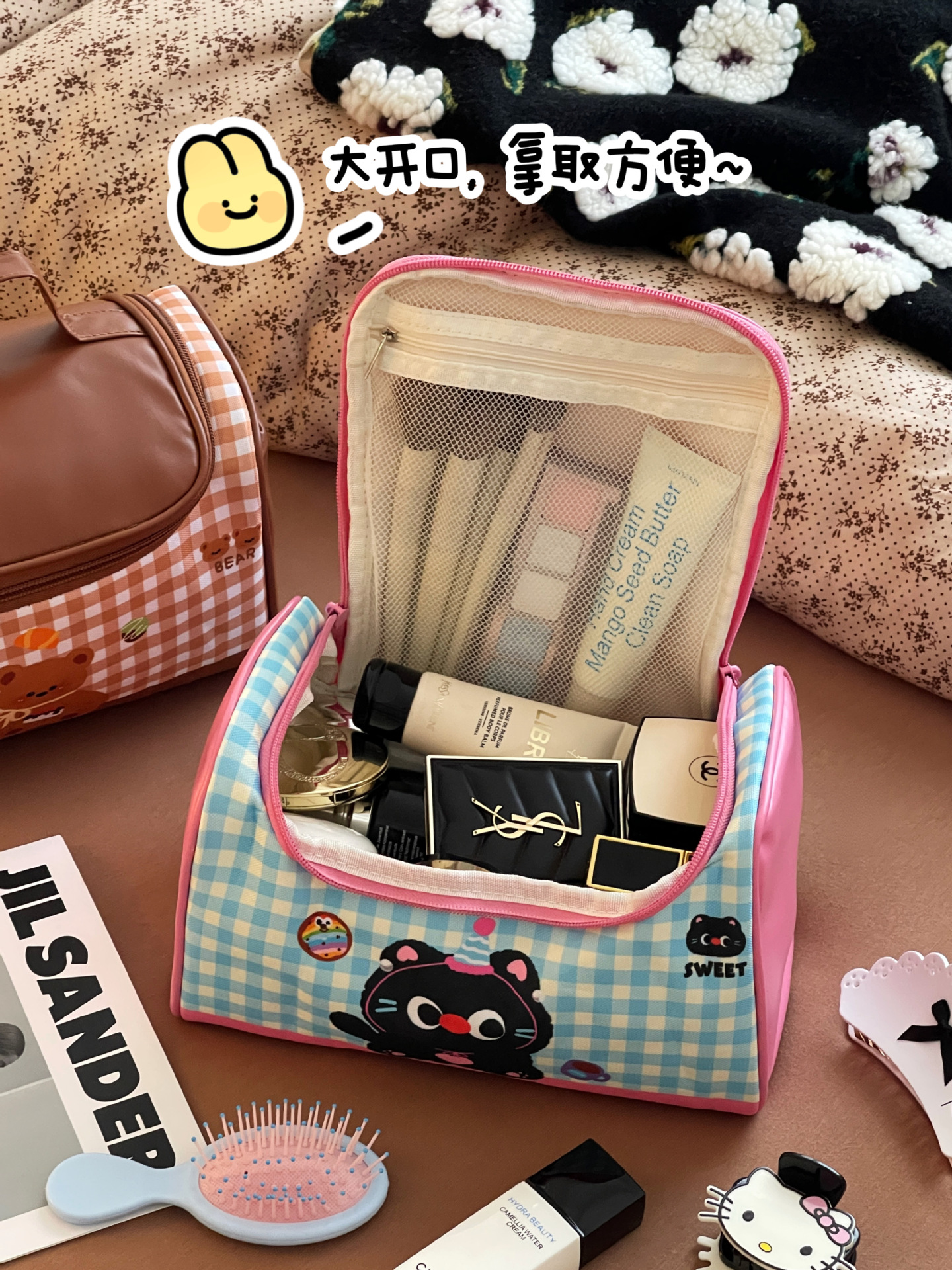 Bagos de maquillaje de gato portátiles de gran capacidad 2025 nuevos viajes lindos bolsa de almacenamiento de productos de lavado y cuidado de la piel