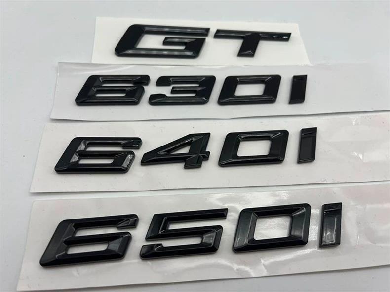 Suitable for BMW's new GT 630i, 640i, and 650i models; includes glossy black emblems, lettering, and rear emblems