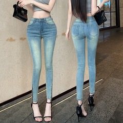 韓国版の杯の足は弾力的に水洗いして白い足のジーパンの女性の春の高い腰のガードルはやせているまっすぐな筒の9分のズボンを現します。