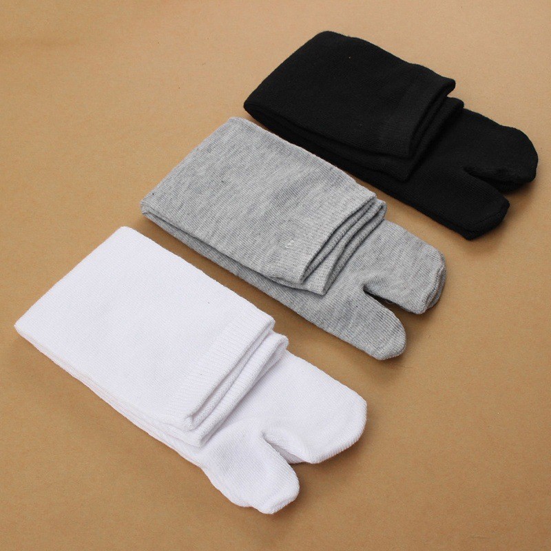 One pair of black and white gray