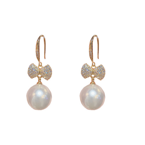 Japanese and Korean exquisite and fashionable ultra-glitter micro-paved zircon bow pearl ear hooks elegant and high-quality earrings wholesale