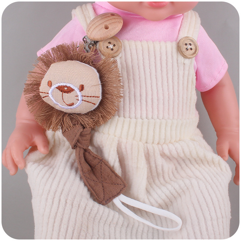 Nuevos suministros para bebés de haya clip de chupete león animal algodón lino cinta chupete cuerda bebé chupete cadena