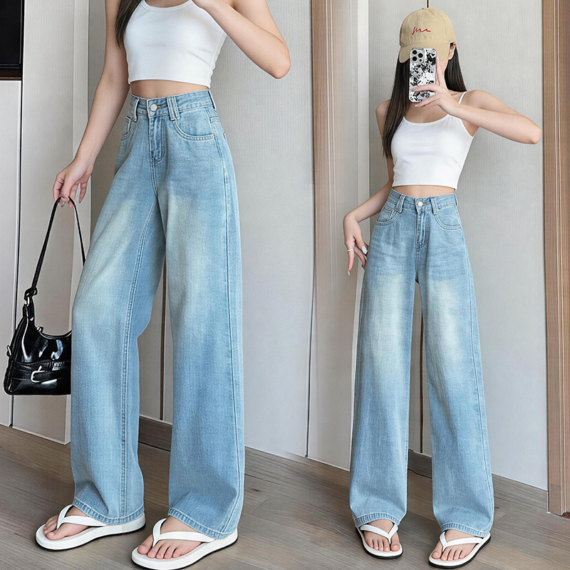 Petite vintage distressed wide-leg pants, high-waisted, slimming, with a draping effect, light blue, loose-fitting, floor-length denim trousers Petite vintage distressed wide-leg pants, high-waisted, slimming, with a draping effect, light blue, loose-fitting, floor-length denim trousers