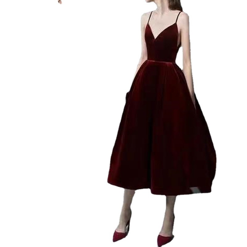 Nueva moda elegante estilo Socialite sin espalda Correa con cuello en V de media longitud vestido de color sólido vestido de banquete de las mujeres