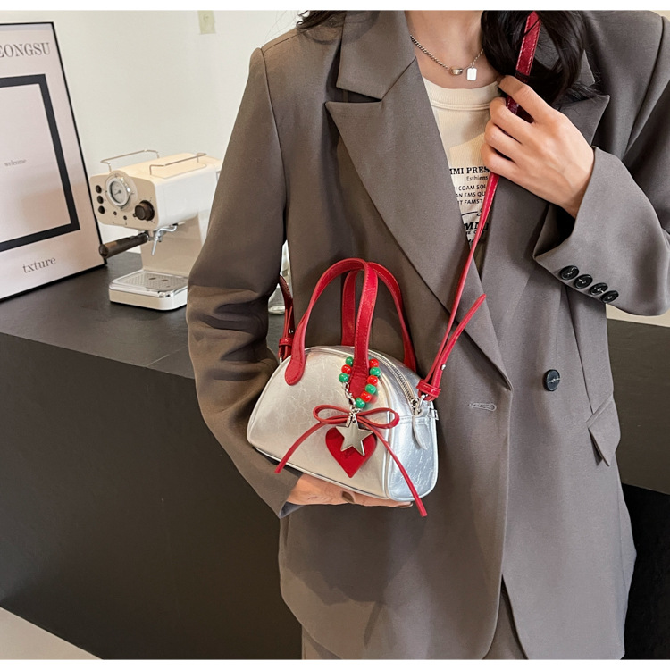 Women's Medium Pu Leather Heart Shape Streetwear Semicircle Zipper Dome Bag display picture 20