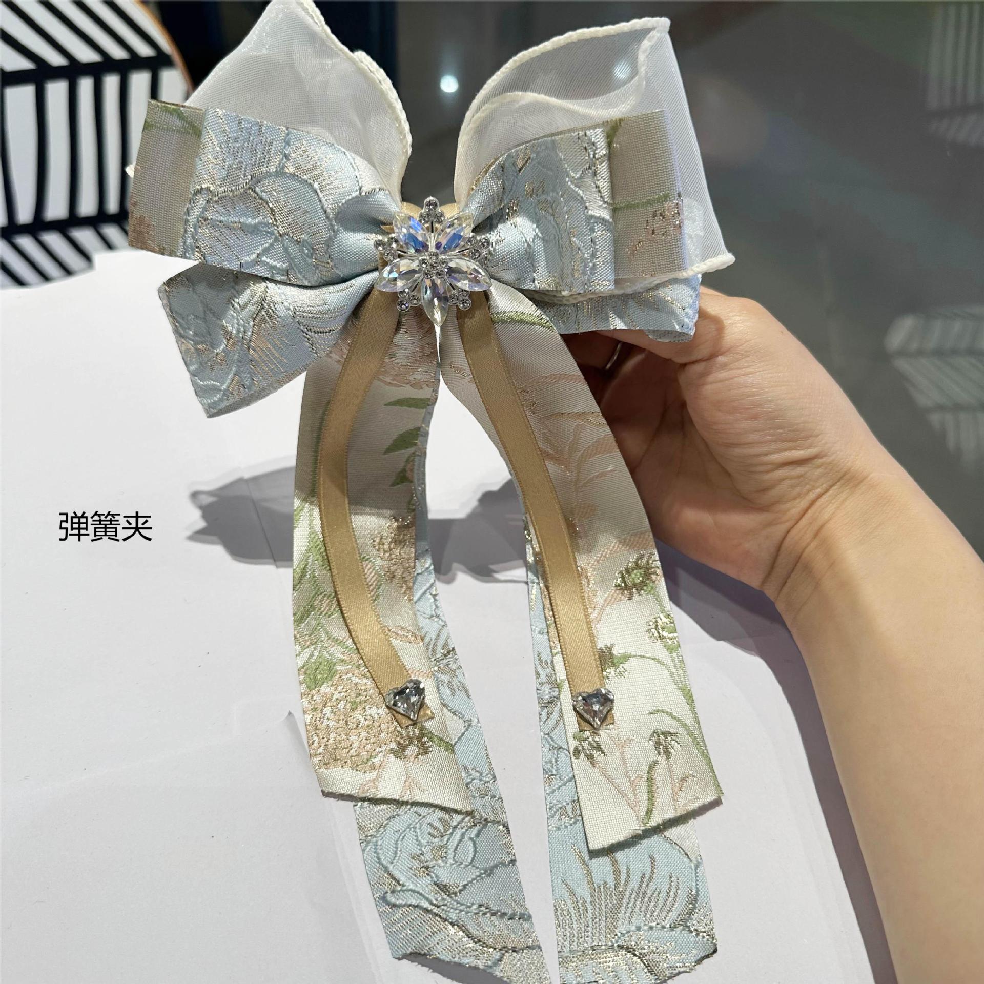 新款中國風閃亮水鑽蝴蝶結飄帶髮夾後腦勺彈簧夾古風旗袍漢服頭飾