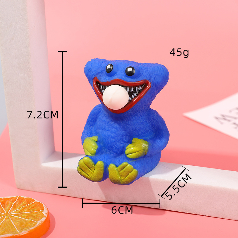 Juguete antiestrés de dibujos animados de niña apretando burbujas, juguete antiestrés de pequeño animal, gadget antiestrés de monstruo verde de Halloween.