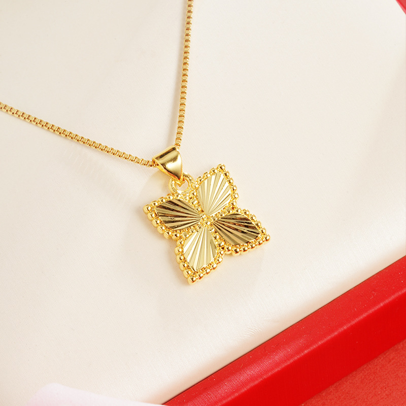 Oro trébol de cuatro hojas colgante antiguo chapado en oro de la flor de las mujeres elegante todo partido transmisión en vivo caliente suministro al por mayor Yiwu