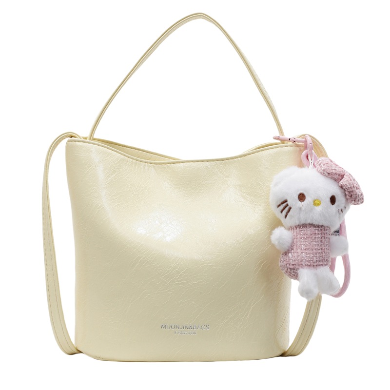 Bolso de cubo de viajero de gran capacidad simple de moda de moda para mujer 2025 nuevo bolso de mensajero de hombro casual de color sólido popular