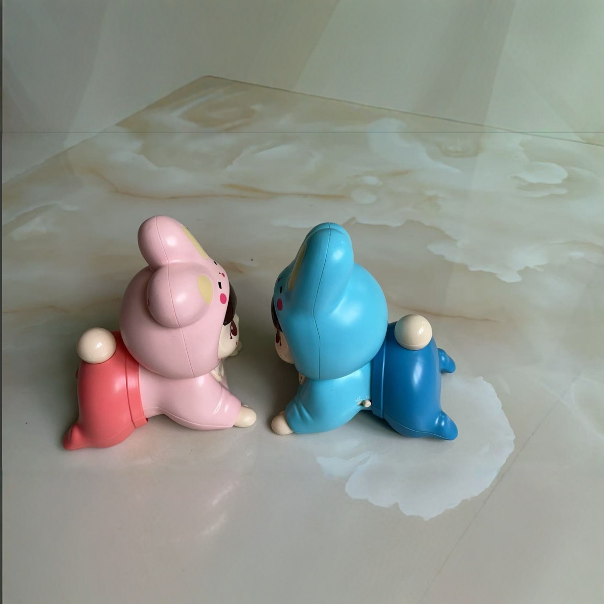 Juguetes eléctricos para bebés transfronterizos, muñecas rastreadoras, muñecas guiadas, artefactos mágicos, dibujos animados, juguetes electrónicos