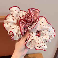 赤いのは軽くて豪華で甘い波点の大腸のポニーテールのかわいい髪輪の縄団子の頭皮の高級な髪飾りの新型です。