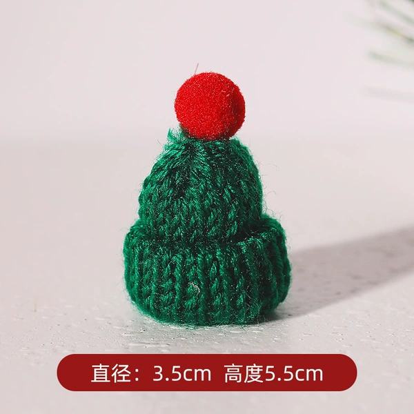 Green hat red ball