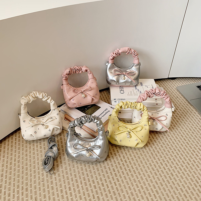 Nuevo bolso para niños dulce pequeña flor fresca bolso de hombro de niñas lindas bolsas de mano de arco plegado bebé