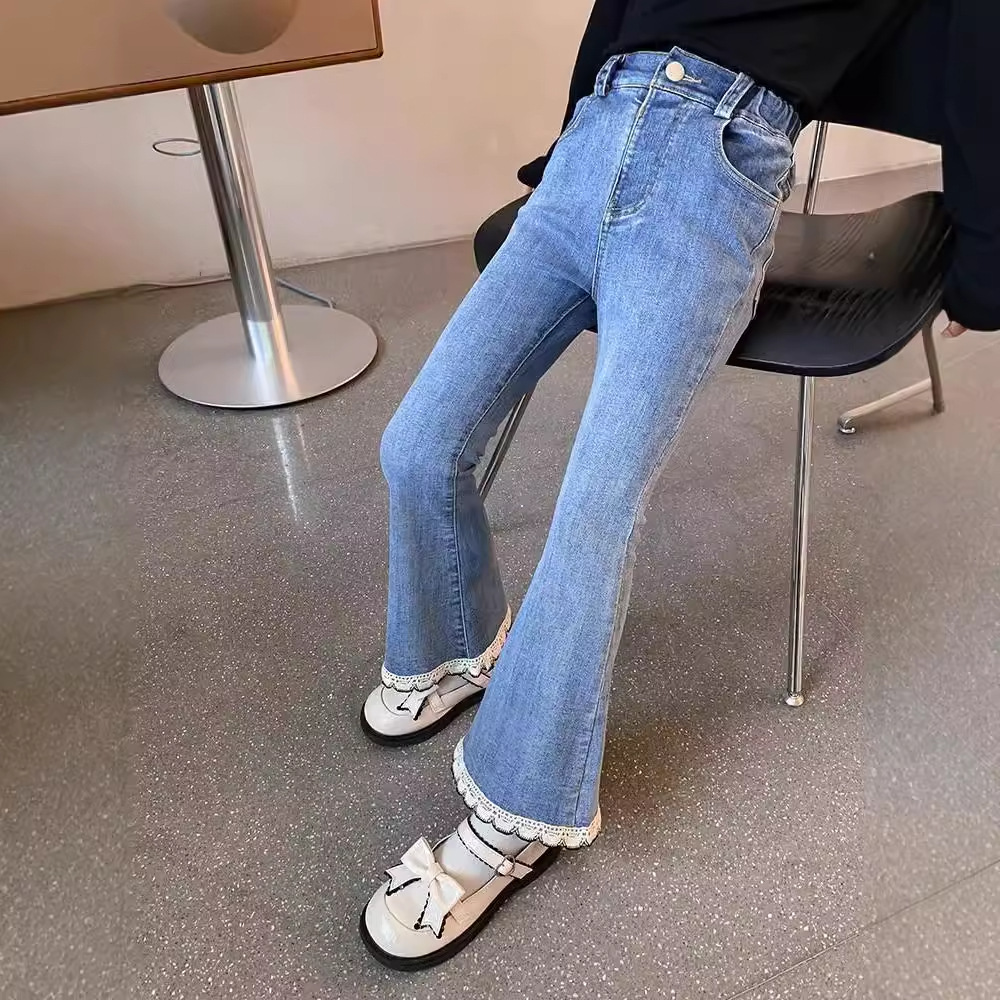 Tendencia de nuevos pantalones infantiles primavera y otoño estilo extranjero pantalones casuales de otoño sueltos pantalones vaqueros de otoño de niña