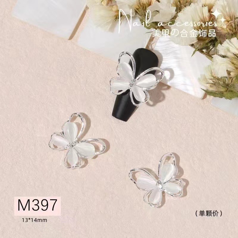 Accesorios de uñas Opal Mariposa nueva flor de lujo ligero Aleación de diamantes accesorios pegatinas de uñas decoración de diamantes de imitación al por mayor